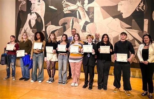 Award winning students holding their certificates